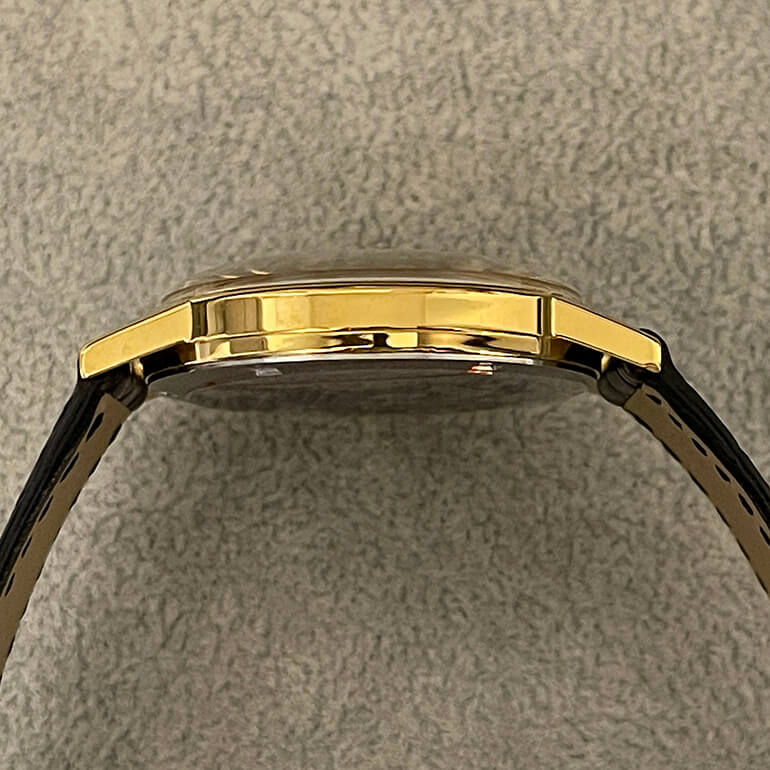 オメガジュネーブの再メッキ修理の出来上がりの側面２