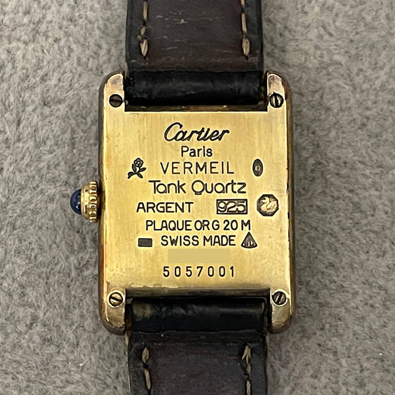 カルティエマストタンクの変色取り修理前の裏面