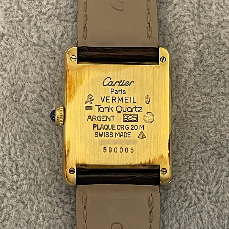 変色取り修理前のタンクの裏面