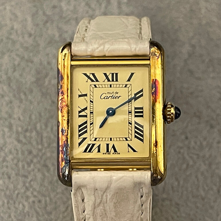 カルティエマストタンクの変色取り修理前-1