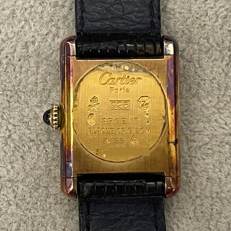 カルティエマストタンクの変色取り修理前の裏面