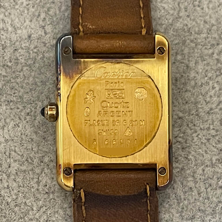 変色取り修理前のタンクの裏面