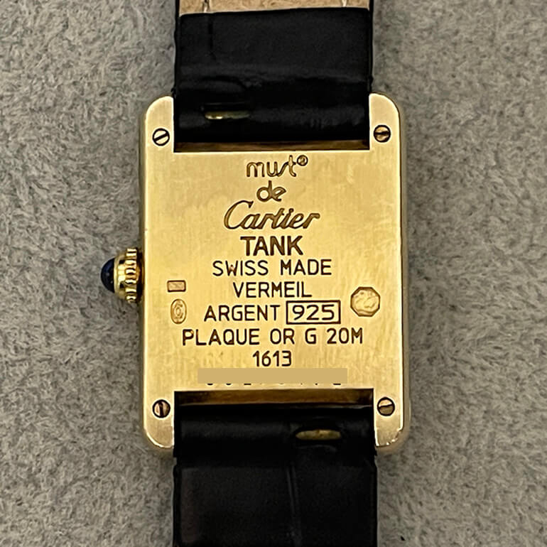 カルティエタンク再メッキ修理前の裏面の写真