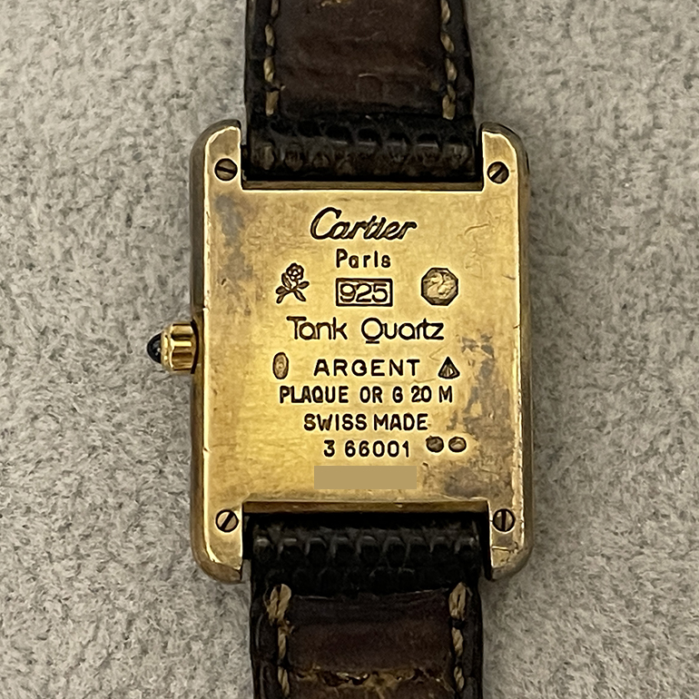 カルティエタンク再メッキ修理前の裏面の写真