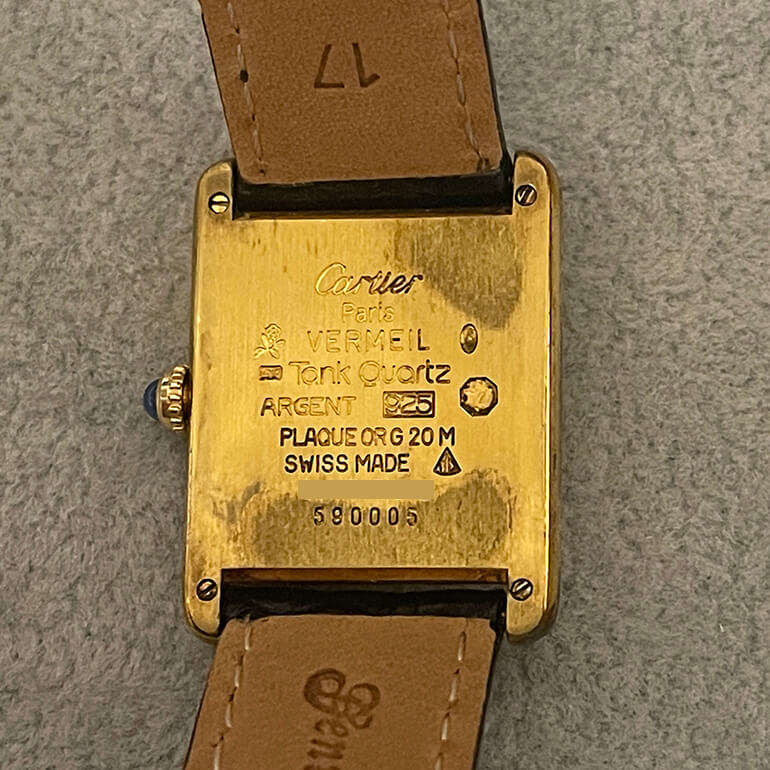 カルティエタンク再メッキ修理前の裏面の写真